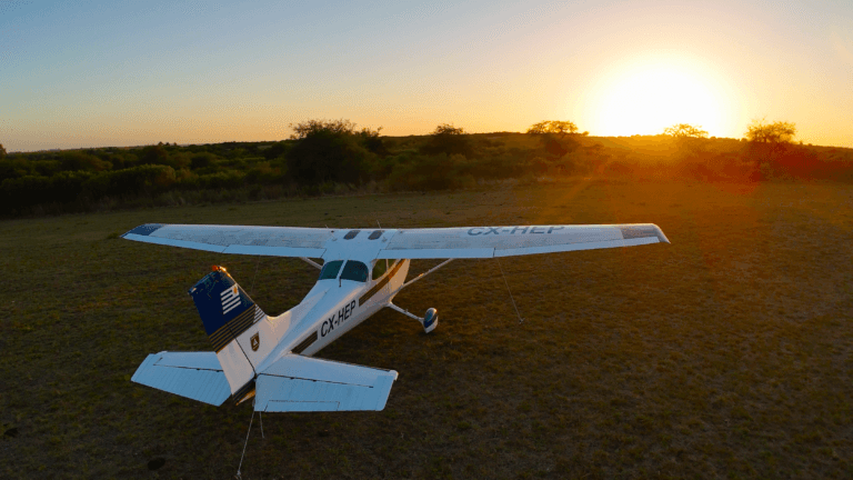 Cessna at sunset on the private airstrip